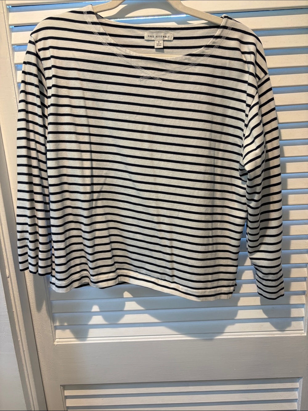 Free Assembly navy and white striped  3/4 length tee with stitching detail